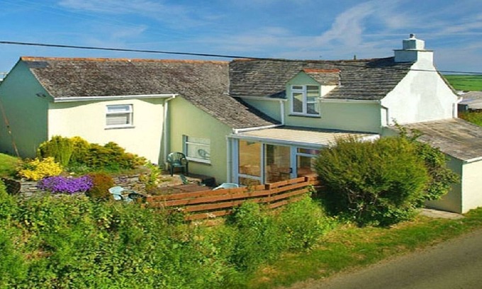 St Teath Cottage | Spacious farmhouse with large childrens play area and fabulous family kitchen.