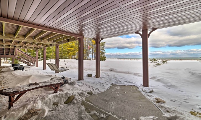 Rogers City Cottage | Spacious Lakefront Home w/Sunroom & Bar!