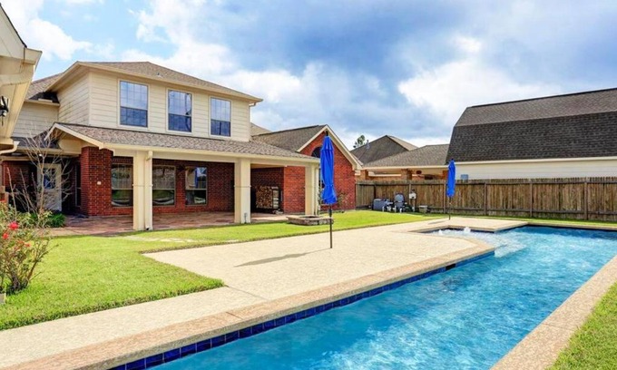 Manvel House | Spectacular Home with A Private Pool & BBQ Grill!