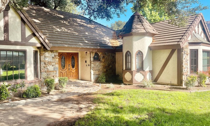 Newhall House | Sprawling 4-Bedroom Tudor Retreat with Spacious Backyard Oasis