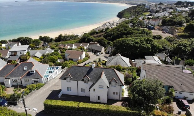 Carbis Bay House | St Ives & Carbis Bay beach sea views with Hot Tub & EV charger