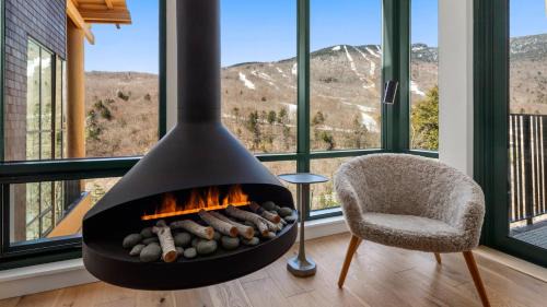 Stowe Area Apartment | Stowe Mt Resort Treehouse Ski in Ski Out Mt Views By Stowe Mountain Rentals