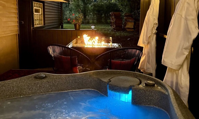 Fayetteville Condo | Studio with Hot Tub, Fire Table & Private Deck!