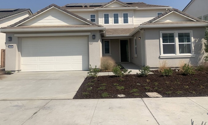 Lathrop Villa | Stunning Brand New Home on a Lake in an incredible neighborhood