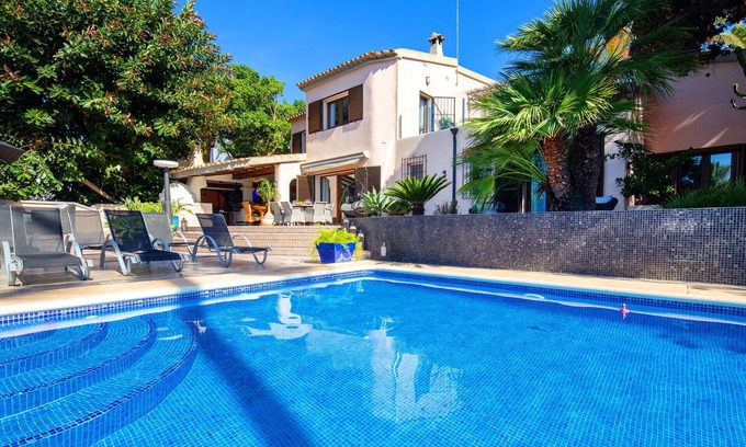 Urbanitzacio la Fustera Villa | Stunning private villa with hot tub, WIFI, private pool, A/C, TV, patio and pets allowed