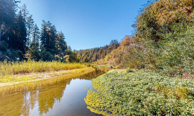 Northwood House | Stunning riverfront estate with hot tub, dock, & fireplace - dog-friendly