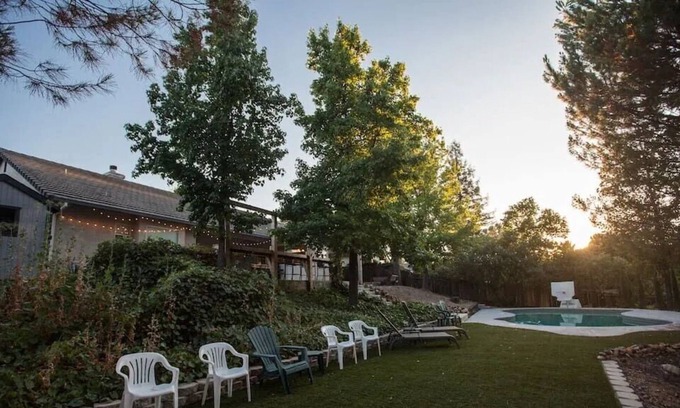 North Hilltop House | Stunning spacious estate + pool + hot tub in oasis
