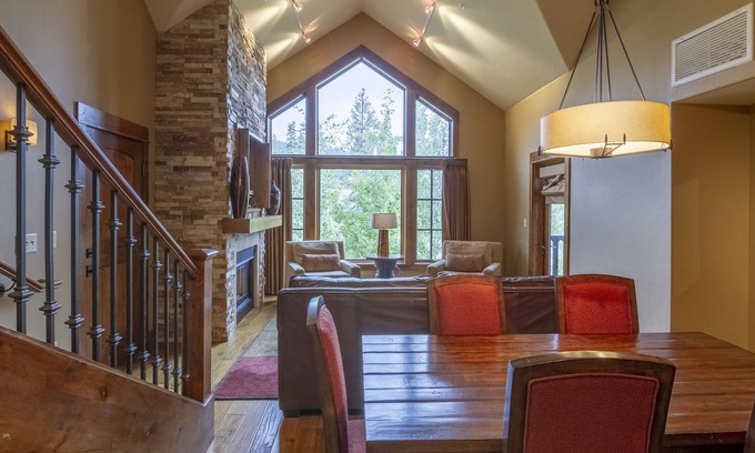 Tamarack Condo | Stunning Wood Interior Design |Natural Stone Propane Fireplace | Private Patio
