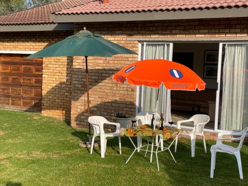 De Deur House | Sunrise Cottage Golfview Lodge