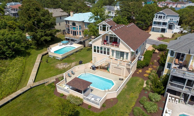 Monteray Shores House | Sunset Thrill: Soundfront | Pool | Shared Dock