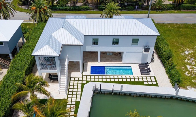 Coury House | Sunshine Getaway in KCB Luxury Pool Home