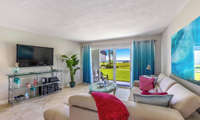 New Smyrna Beach Condo | Surfside 112: Ground-Level with Ocean View Patio, Steps to Pool & Beach
