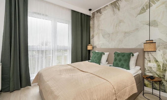 Grunwald Apartment | Tasteful Beige Apartment with Parking by Noclegi Renters