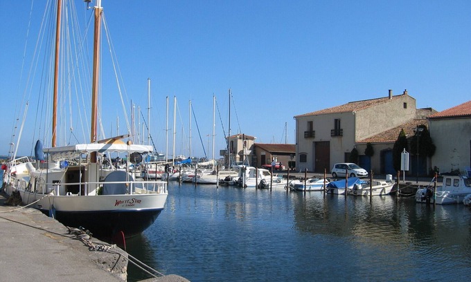 Marseillan Apartment | Terrace waterside views.Au bord de l'eau à Marseillan. Booking 2026 now