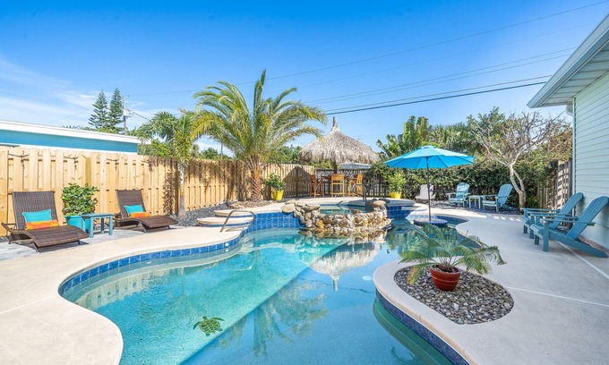 Snug Harbor Estates House | The Oasis House, heated pool/jacuzzi walk to beach