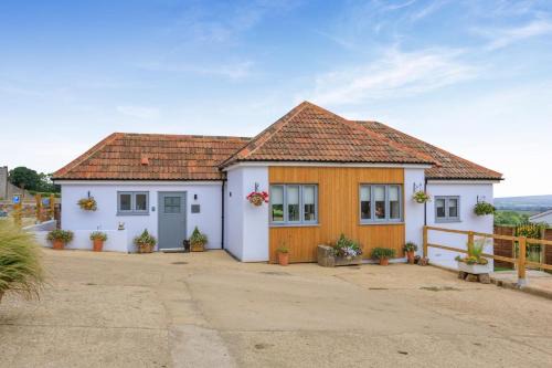 Eleighwater House | The Old Piggery - Heavenly Views Cottage