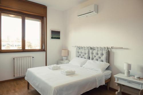 Quartiere XXXI Giuliano Dalmata Apartment | The Spacious Residence with 3 Bedrooms and Private Parking