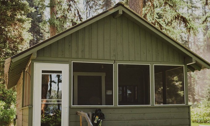 Seeley Lake Cabin | Thimbleberry is at Tamaracks Resort, with a screened-in porch facing the lake.