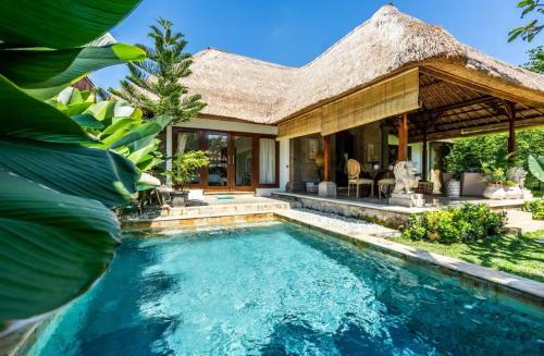 Sanur Kauh Villa | Three Bedrooms Elegant Home The White Door Villa