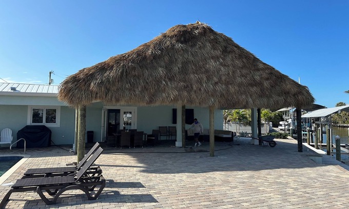 Saint James City House | THREE MASTER SUITES-POOL -WATERFRONT ON CORNER LOT - BOAT LIFT -OUTDOOR KITCHEN