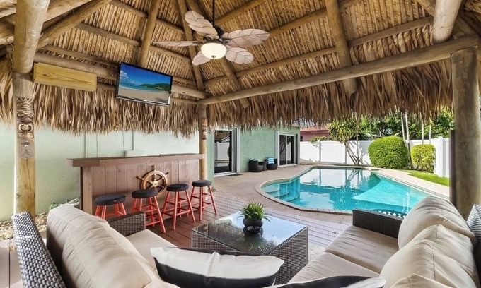 Dania Beach House | TIKI Retreat! Pool/game room! 5min to FLL and BEACH!