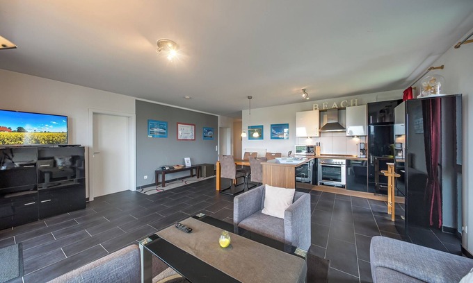 Schillig Apartment | Tolles Ferienapartment an der Nordsee mit Meerblick, Balkon, Sauna und Hot-tub