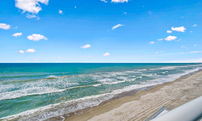 South Patrick Shores Condo | Top-floor, oceanfront condo with balcony