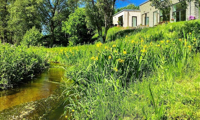 Holstebro Municipality House | Tranquil Riverside Retreat