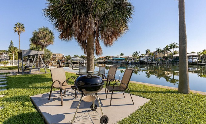 Capri Isle Condo | Treasure Island Waterfront Oasis Minutes to Beach Dock Sunsets at John’s Pass