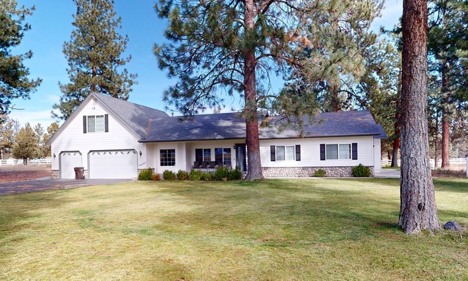 Sisters House | Tree-lined retreat with a hot tub, grill, game room, & W/D - mountain views