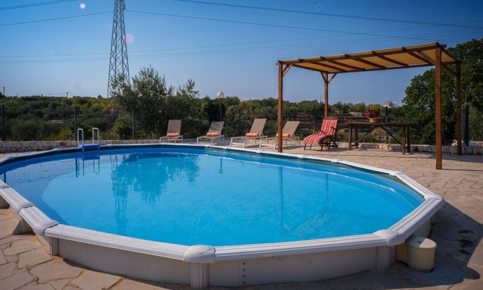 Castellana Grotte Villa | TRULLO IN PRIVATE COTTAGE, SWIMMING POOL, GARDEN, ANCIENT OLIVE TREES, WI-FI, BARBECUE