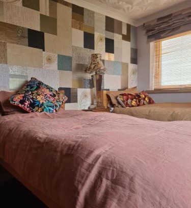 Pill House | Twin room at Fir Tree Lodge with garden view