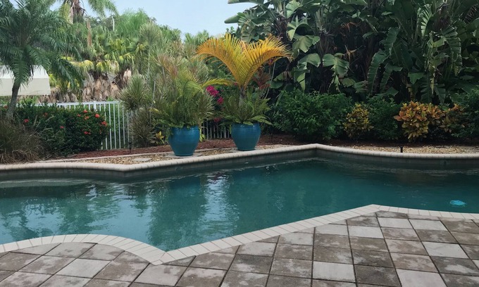Bonita Springs Apartment | Two 1/1 Private Villas with Tropical Pool and Bar, Canal View