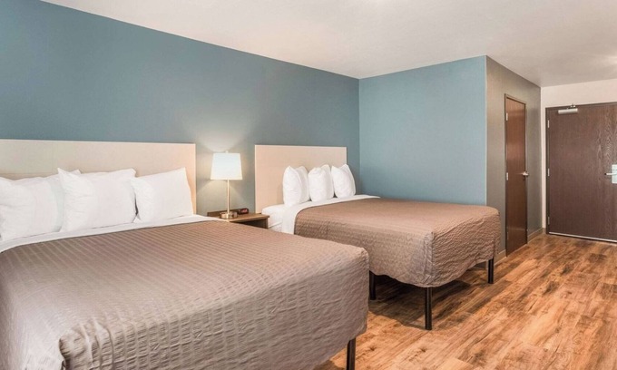 Newnan Hotel | Two Comfortable Room w/Large Refrigerator & Cooking Space for Families