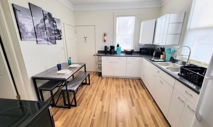Galesburg House | Two-tone Train Home! King bed, Pet friendly, Foosball!