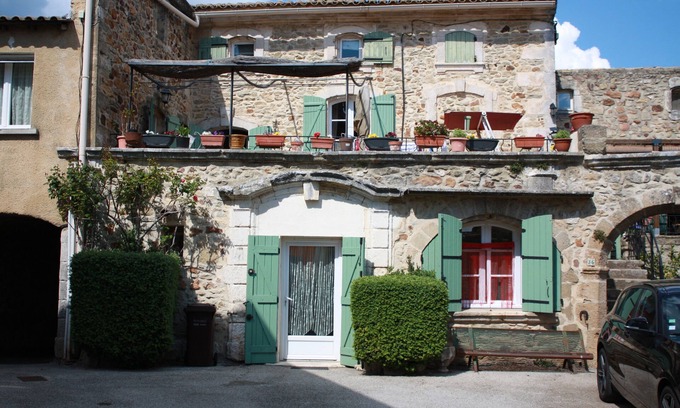 La Bruguiere House | Typical restored stone village house with cool, tranquil vaulted ceilings.