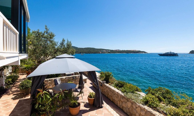 Lozica Apartment | Unique Beachfront 2BDR Apartment With a Private Beach and Spacious Terrace