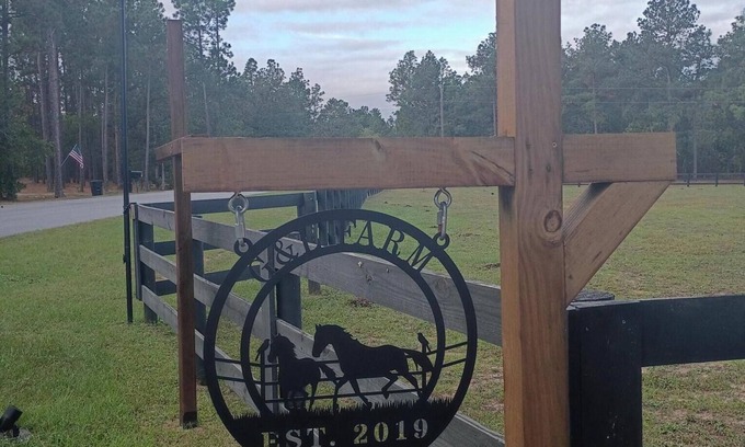 Langley House | Unique Hangar & RV Experience with paddock and shelter for Horses