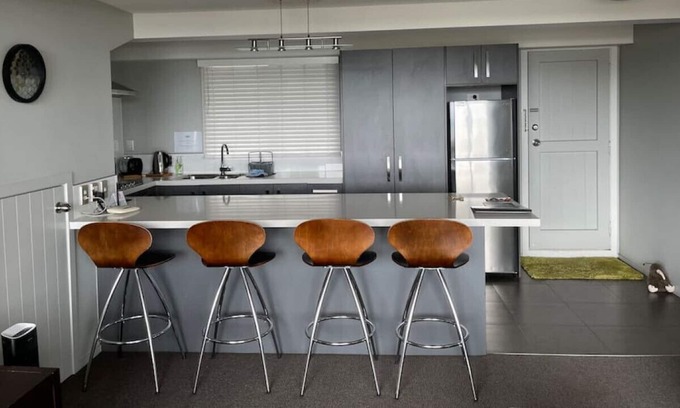 Two Mile Bay Apartment | Unit 16 · Luxury by the lake