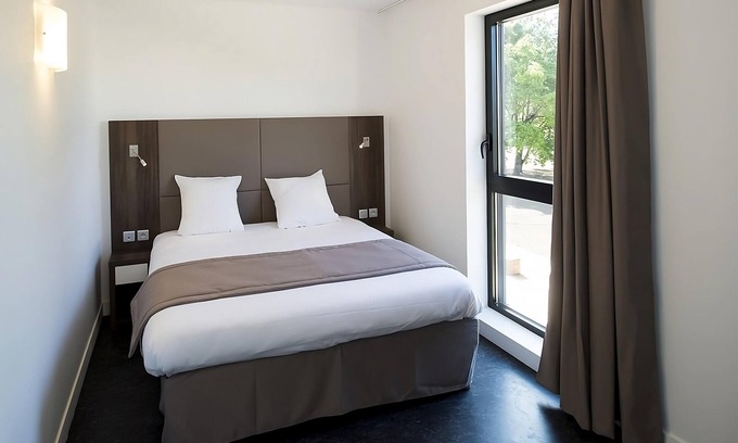 Dijon Hotel | Unwind in a Comforting Room with Nearby Tram to City | Free Offsite Parking