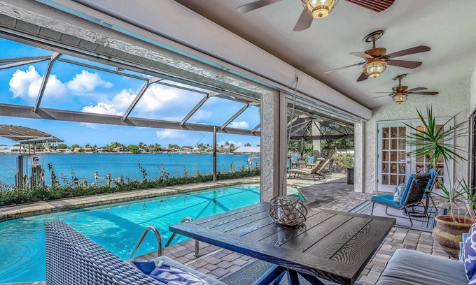 Eight Lakes House | Upscale lakefront home w/private saltwater pool, dock, free WiFi, & central AC
