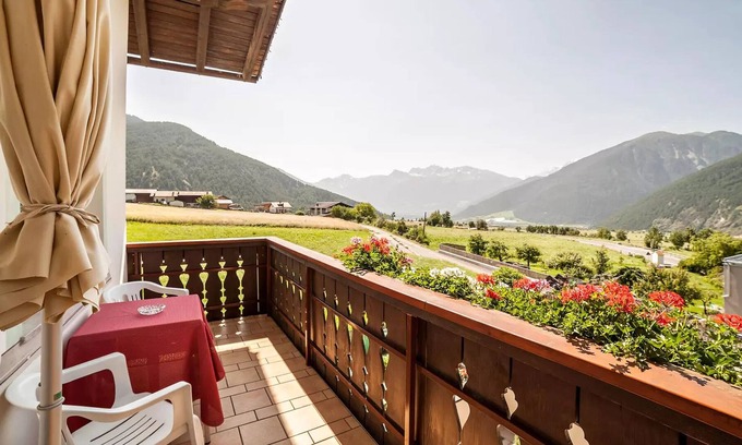 Burgusio Apartment | Vacation Apartment "Sonnenhof Sonnblume" with Mountain View, Terrace & BBQ