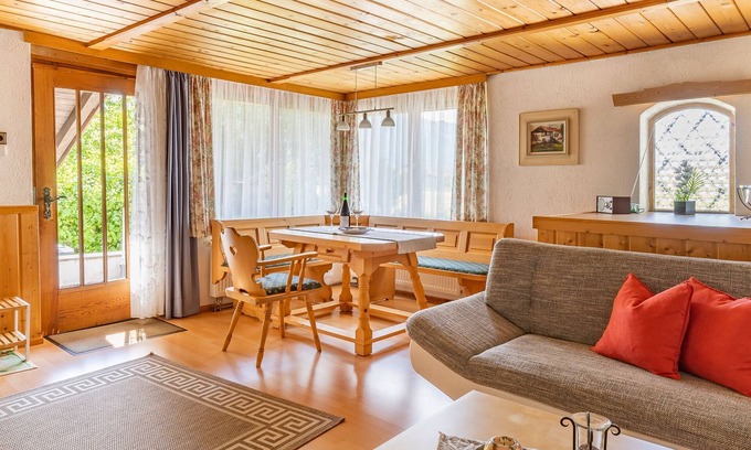 Grassau Apartment | Vacation home 45 sqm, for 2 pers., bedroom, living room, kitchen, south-facing terrace, large balcony. Sunbathing lawn, quiet location with mountain views.