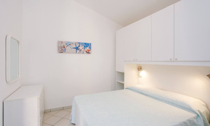 Agrustos House | Vacation Home "Appartamento Della Sughereta" with Sea View, Terrace & Wi-Fi