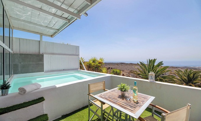 Macher House | Vacation Home 'Loft Amanecer' with Sea View, Wi-Fi and Air Conditioning