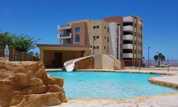 El Combate Apartment | Vacation in Paradise 5 Star Apartment with Ocean View and Pool, Wifi Ready