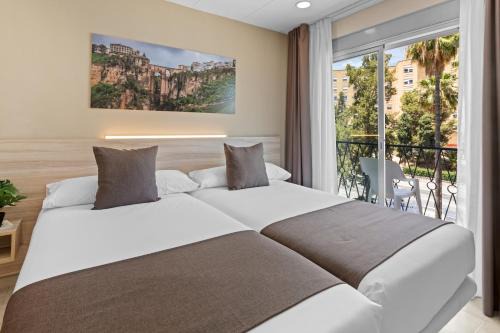 Cruz de Humilladero House | Vas Málaga Ciudad