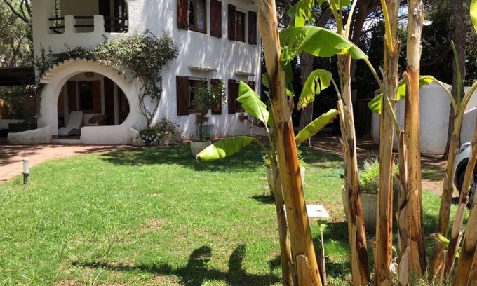 Santa Margherita di Pula Villa | Villa of Graces. White beach and emerald sea 40 meters from the garden
