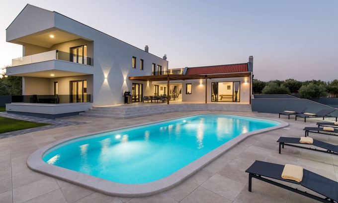 Peruski Villa | Villa Posidonia near Pula with sea view and surrounded by olive trees