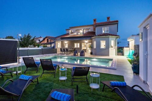 Loborika Villa | Villa Spa Otium for 8 people with 32 m2 heated pool, outdoor cinema, kids playground & spa area
